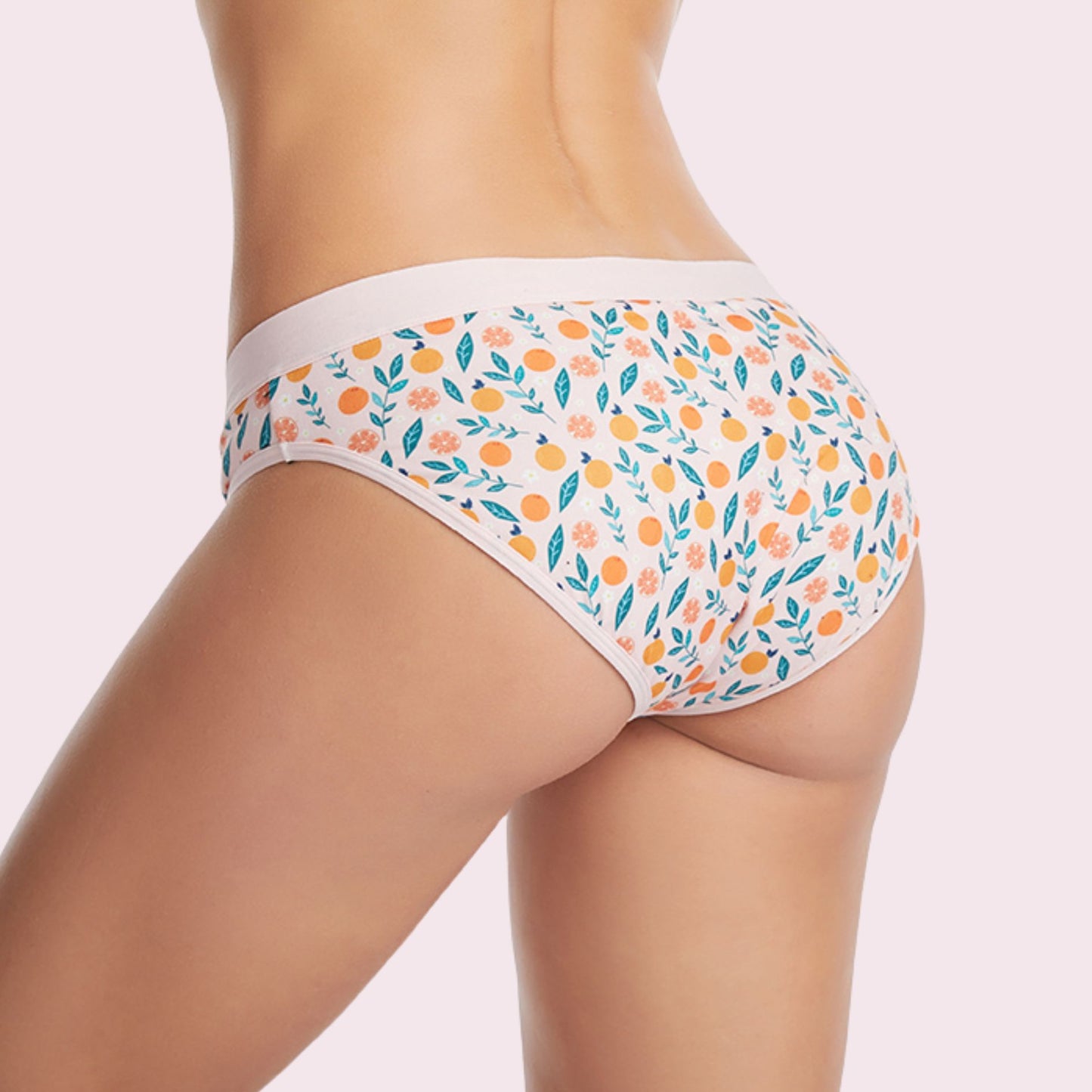 Vue arrière de la culotte en coton pour Ados, couleur nude pâle avec des motifs d'oranges