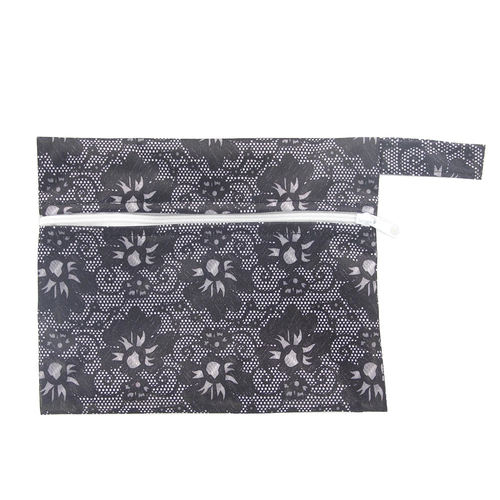 Pochette de transport imperméable -noir et motifs