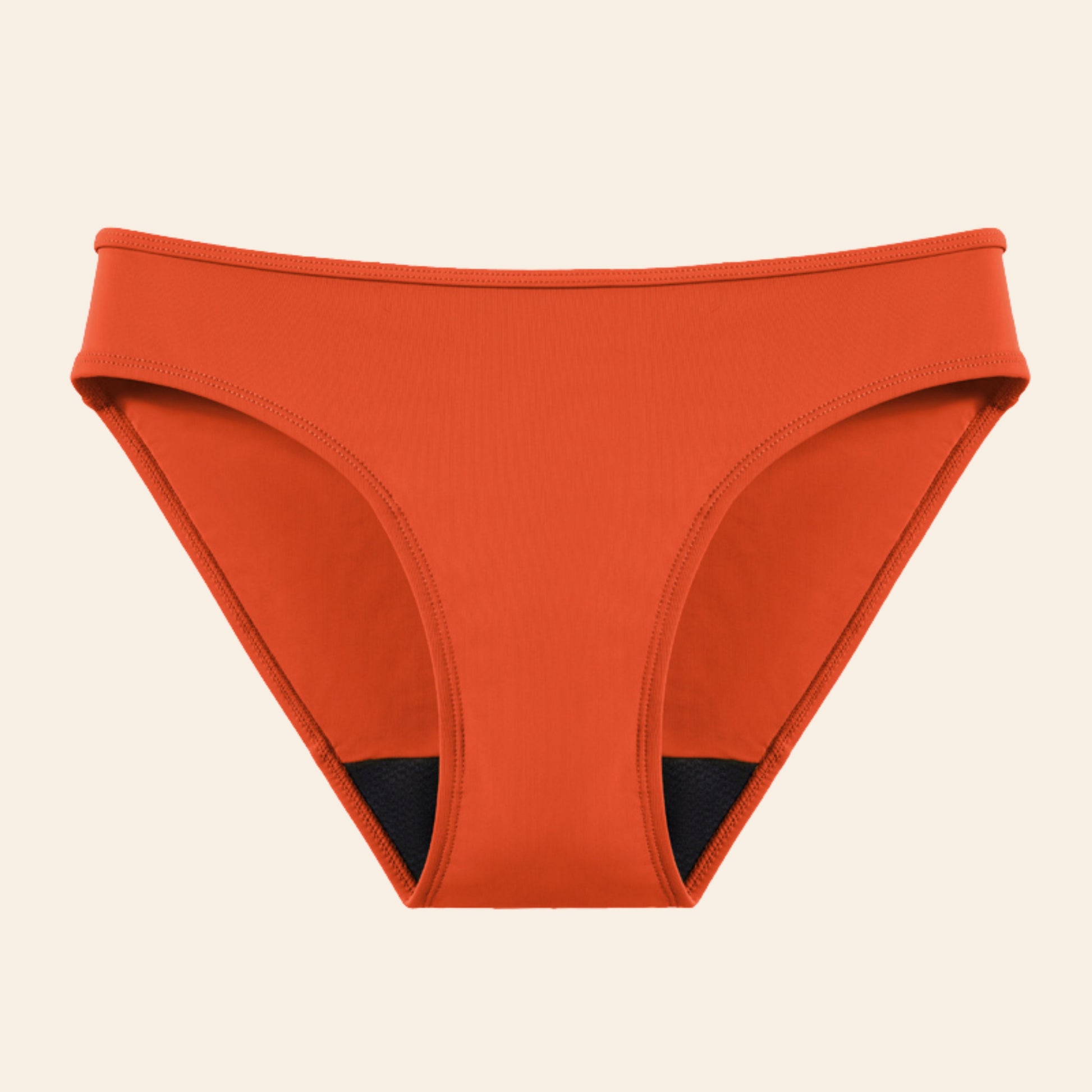 Vue produit à plat du bas du Maillot de bain menstruel le classique, couleur orange
