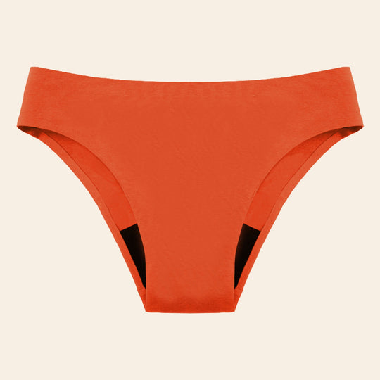 Vue produit à plat du bas de Maillot de bain menstruel sans couture, couleur orange