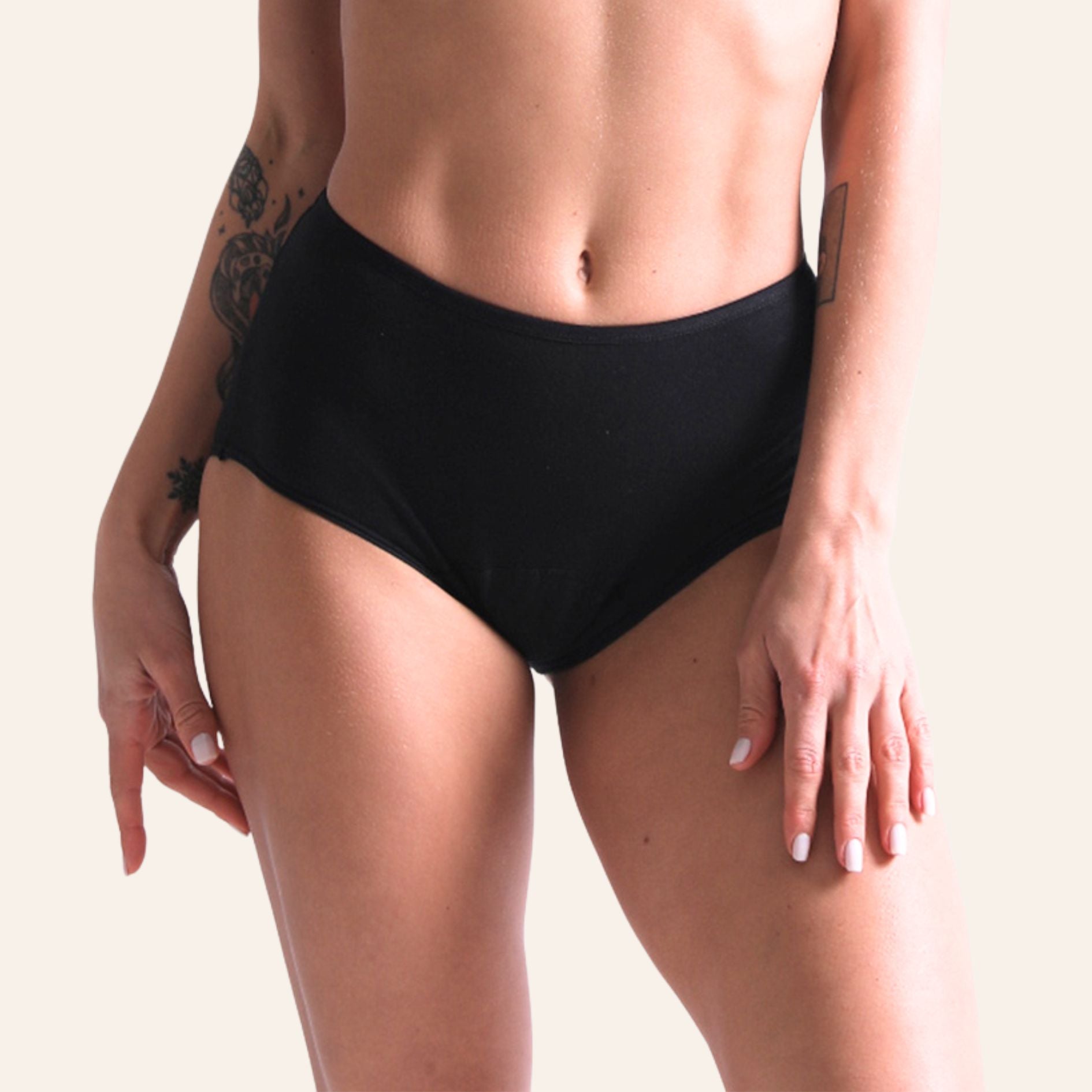 Vue avant du shorty menstruel noir TabooPlus en fibre de bambou, ultra-confortable pour une protection jour et nuit.
